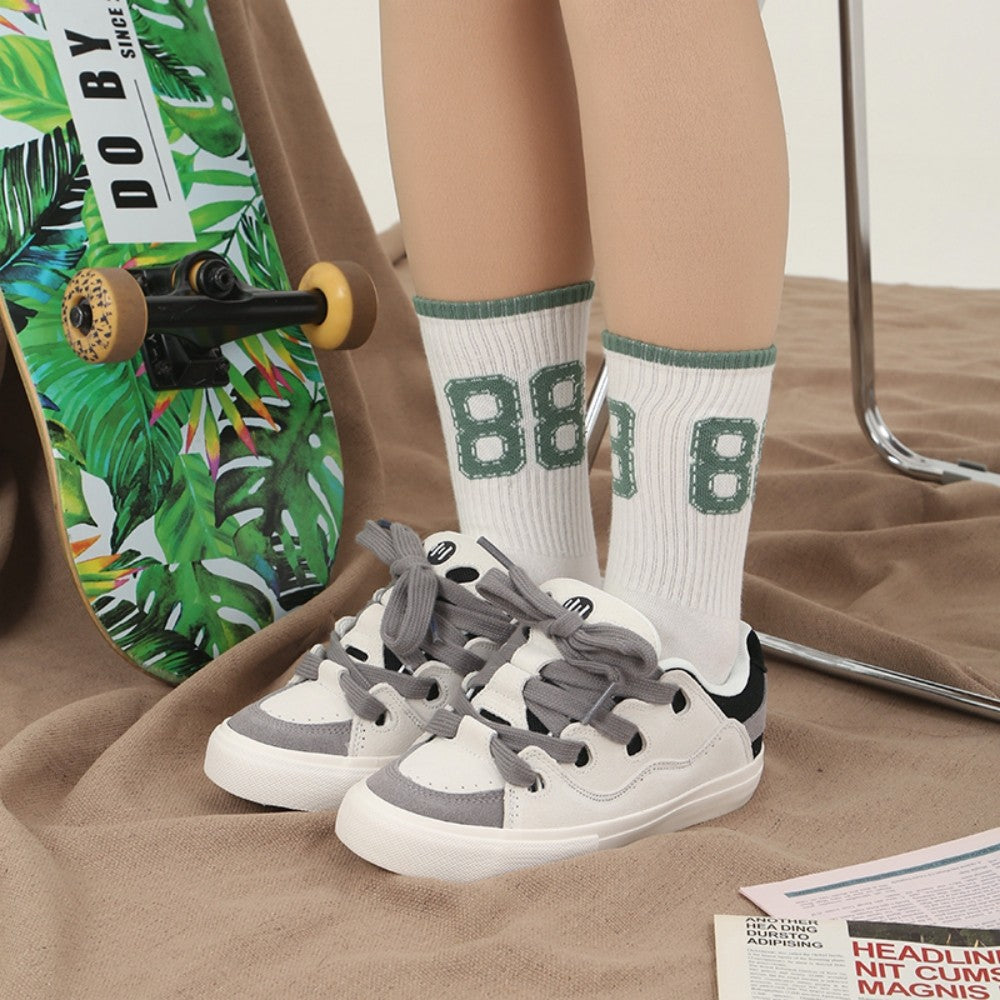 BAKE grau schwarz weiß dreifarbige Nähte Low Top