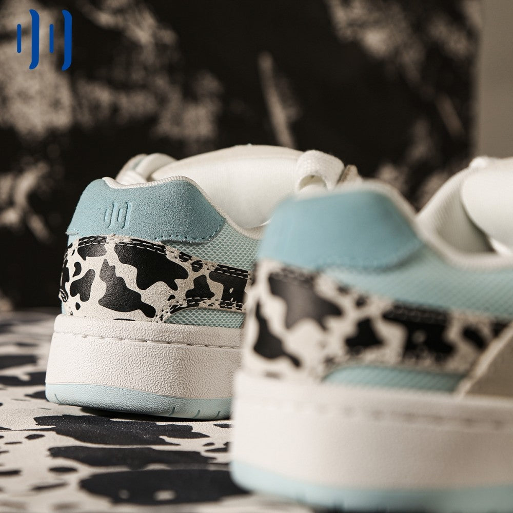BAKE II cow print and white stitching low-cut cowhide