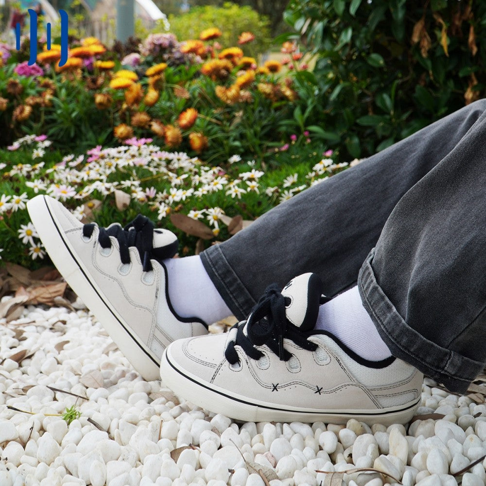 BAKETH White and black paneled suede low top
