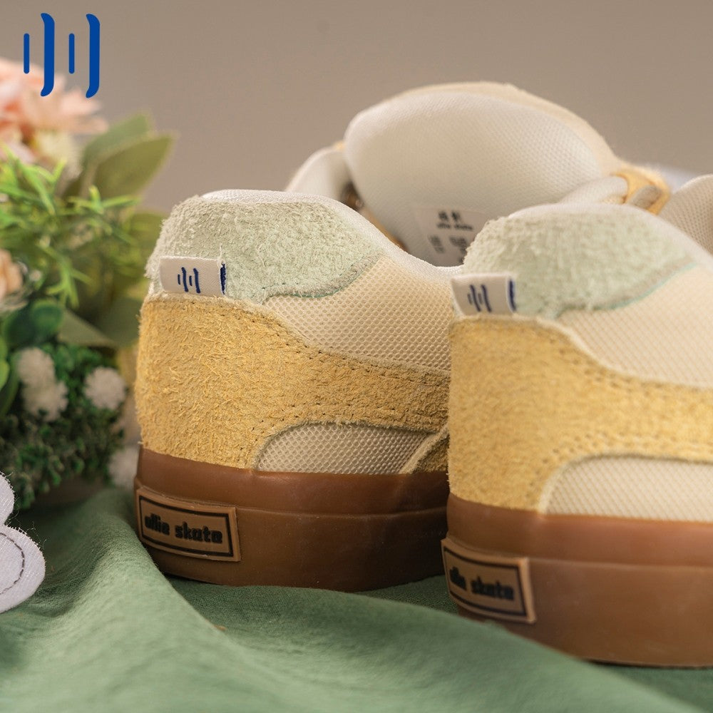 BAKE Yellow white paneled suede low top